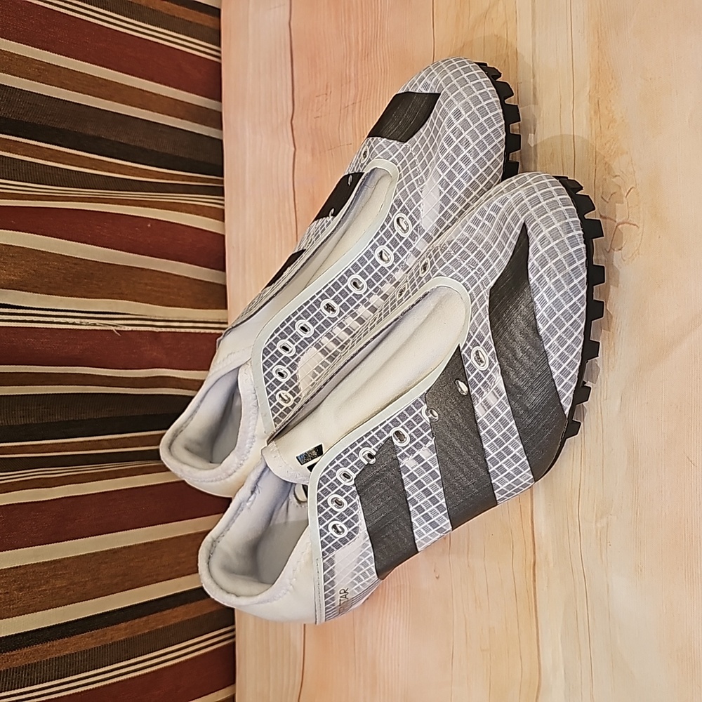Adidas track shoes.